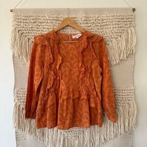 The Great Eyelet Flutter Top